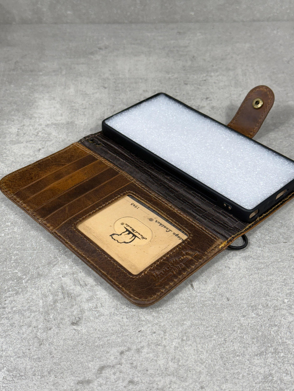 Handmade Leather Wallet Case for Google Pixel Fold: Paw Print Design